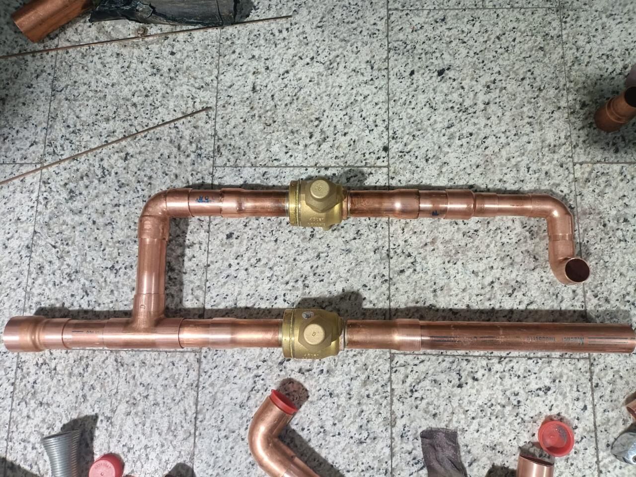 Brazed suction manifold, fabricated on site